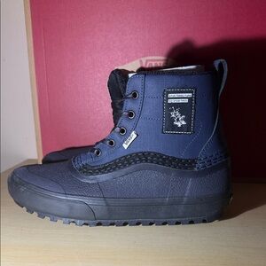 Vans Navy and Black High-Top Sneakers
